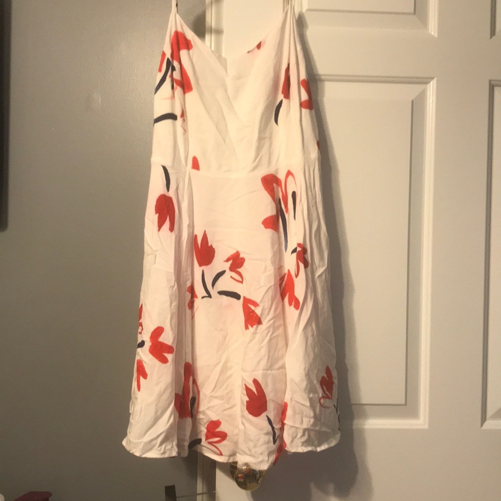 White dress w/ red flowers and navy blue accent